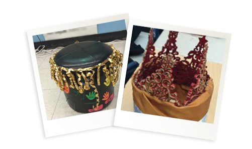 pots2 Building Wings Building Wings Student made authors chair with gold garland and student made red authors crown