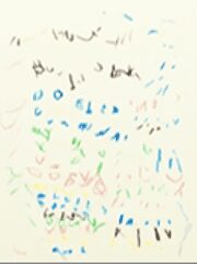 A childs Level 2 writing in multiple colors on a piece of paper