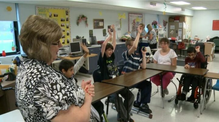 Jenay Prytula works with students in her Special Education classroom.