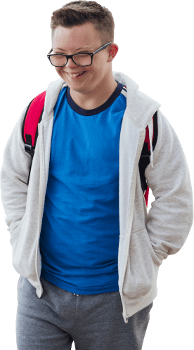 Our Mission Banner Building Wings Building Wings A student wearing a blue shirt grey hoodie and red backpack smiles